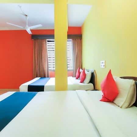 Capital O 71729 Lucky Inn Бангалор Екстериор снимка
