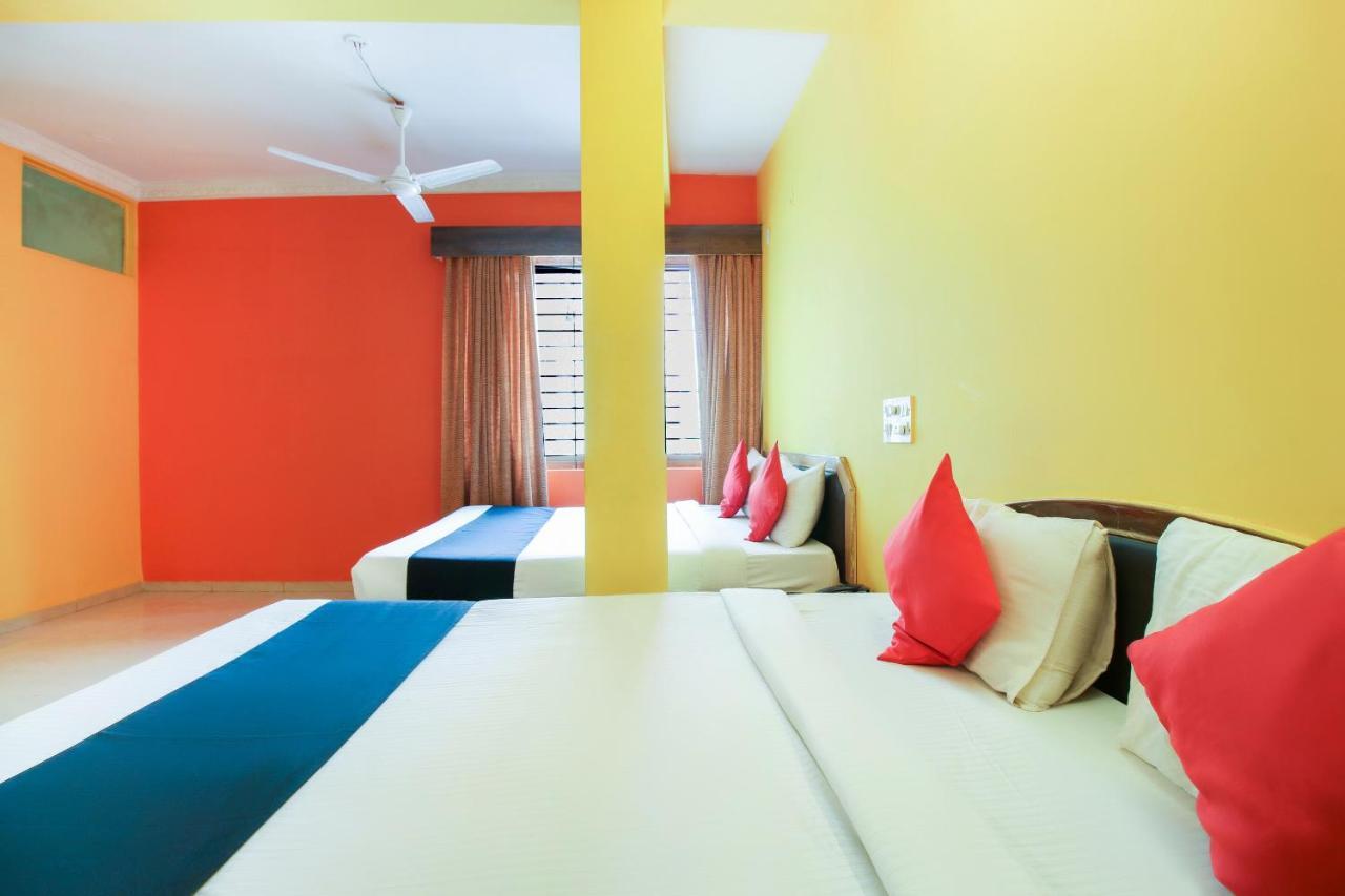 Capital O 71729 Lucky Inn Бангалор Екстериор снимка