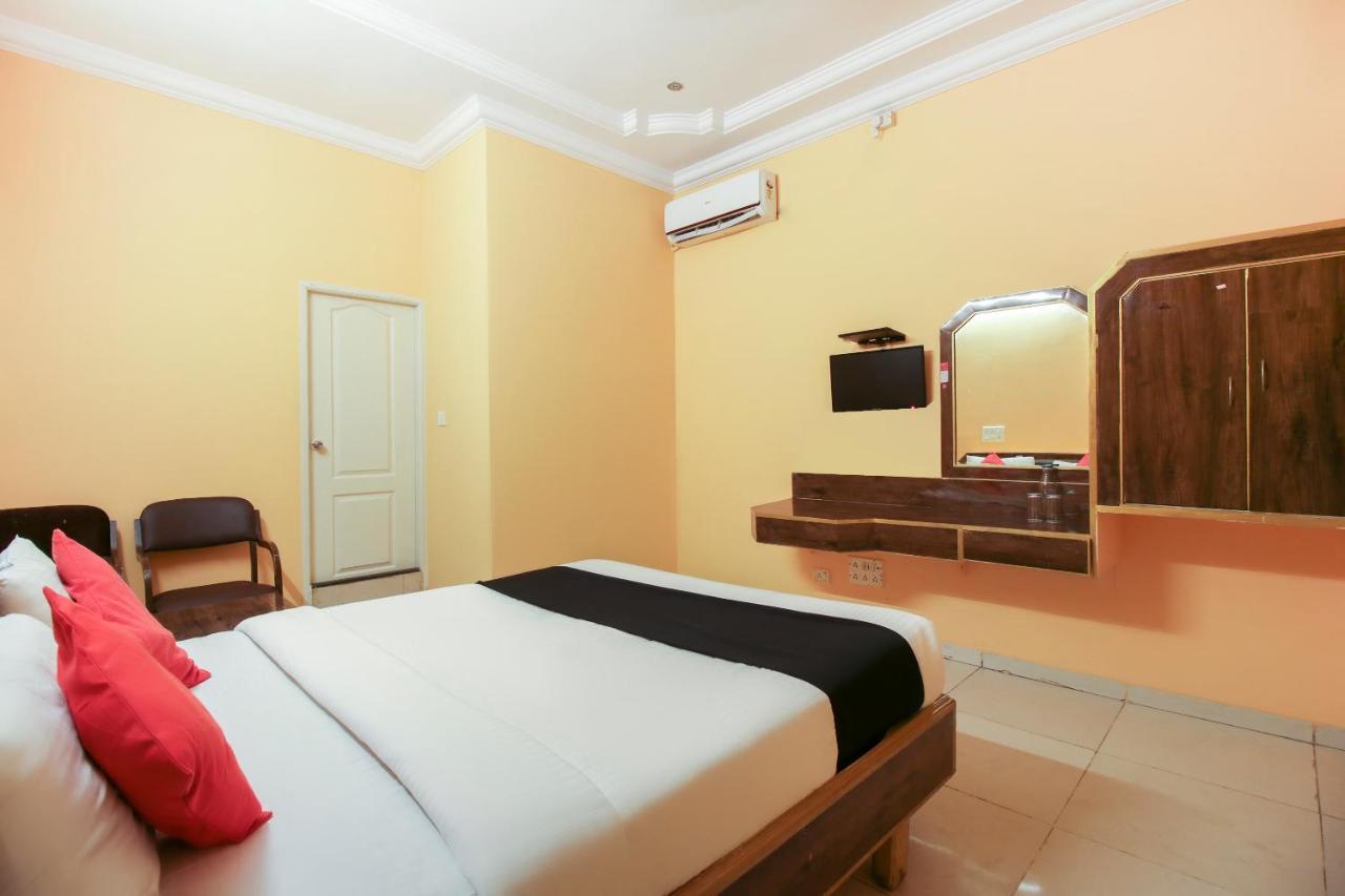 Capital O 71729 Lucky Inn Бангалор Екстериор снимка
